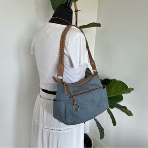 blue vintage shoulder bag with brown straps